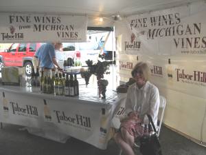 My lovely wife Sue relaxing at the Tabor Hill Winery booth.