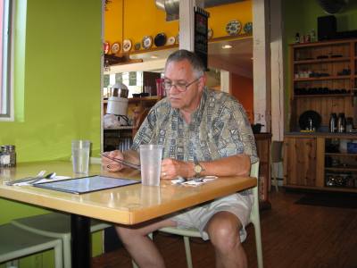 I'm checking the menu at Blue Plate Cafe.  Our favorite for a weekend breakfast.